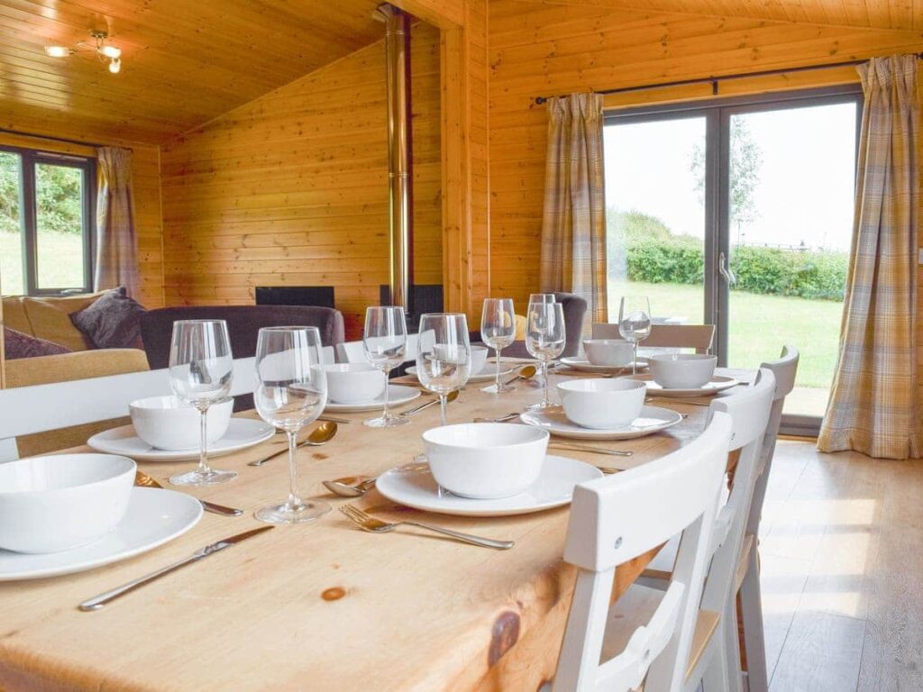 The dining room table set for dinner